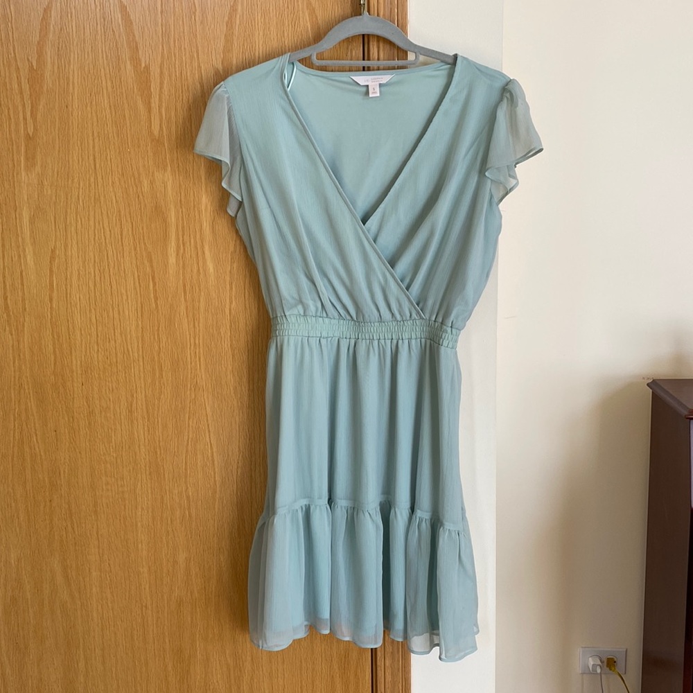 Light mint/teal short flowy dress with dainty sleeves.